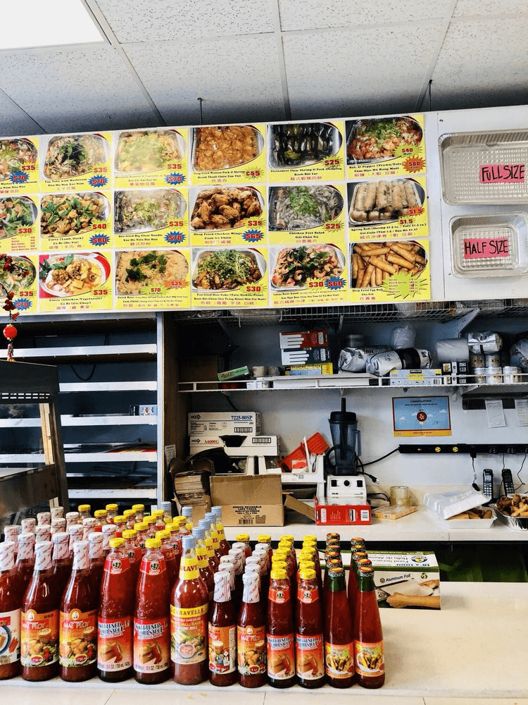 The SpringRoll House Deli counter, menu board and sauces